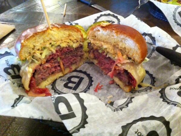 CarolineJ211's tweet photo. The Fat Doug. Burger topped with pastrami, slaw and provolone. Major food coma for this flight home #cleveland http://t.co/57MPz04nTu