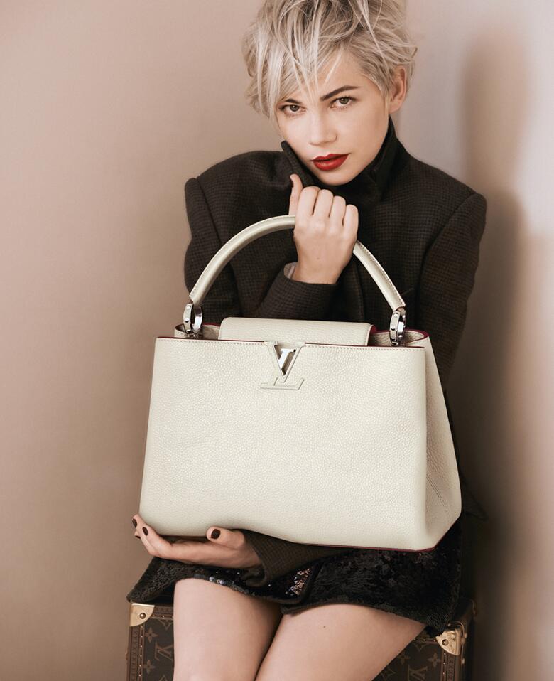 Louis Vuitton on X: In 2013, #LouisVuitton introduced the timelessly  feminine Capucines handbag with Michelle Williams.   / X