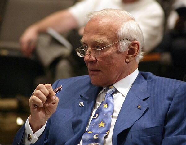 Buzz Aldrin wears his reading glasses like this.