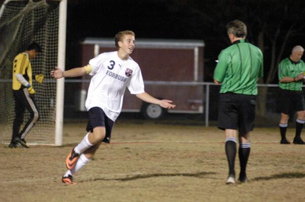 Alan Clark celebrates after firing home a PK to send <a href="/ForbushSoccer/">FHS Men's Soccer ⚽</a> into the 2nd round with a 5-3 win