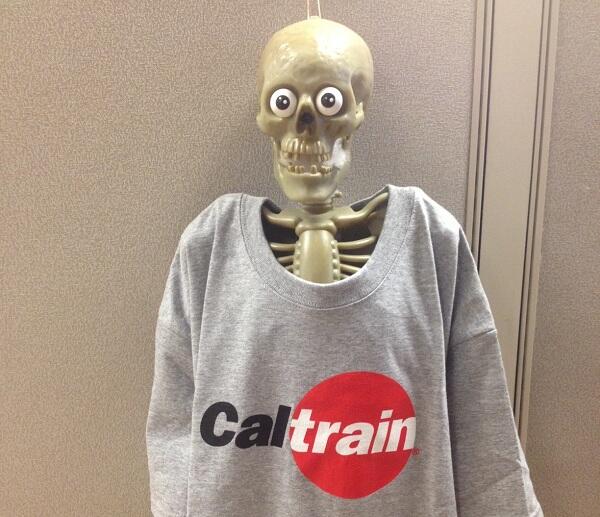 Caltrain's tweet photo. There's a Caltrain tshirt for the best Halloween costume. Snap a spooky selfie on Caltrain, tag it #Ghoultrain. http://t.co/to92bKIAiL