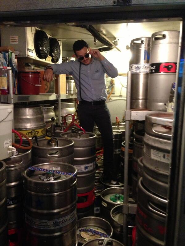 Our kegroom floor has been replaced w/ Novemberfest kegs Officer jake doin his final inspection of all the stong ales