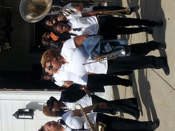 TremeFest's tweet photo. The Pinettes leading the crowd out of the church. http://t.co/suvRB8exoy