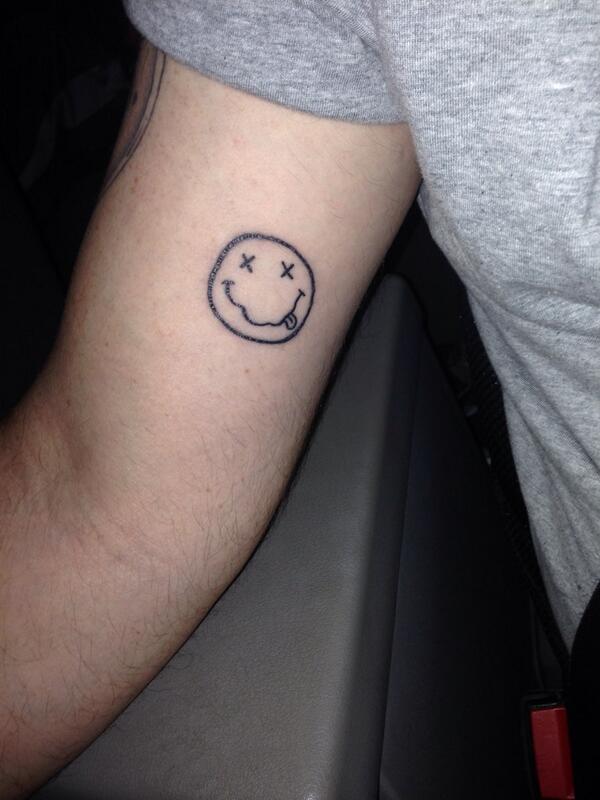 Smiley face tattoo I just got done for my birthday  rgrunge