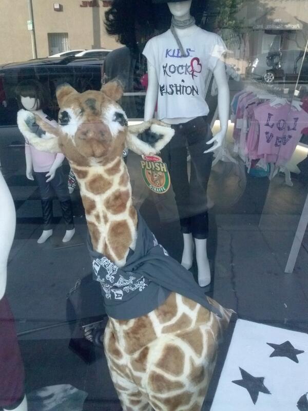 yonnivalencia's tweet photo. Signs a fashion trend is reaching its peak: this punk giraffe on Melrose Ave. #therearenowords http://t.co/kht3dk04wH