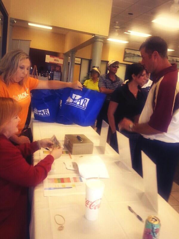 kids_PACK's tweet photo. Handing out goody bags at registration for the tournament #fundraising #fun http://t.co/aEjT0CSagi