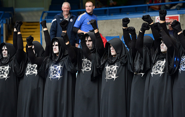 BXmQGFgIUAAuJFk So Scary! After appearing at Bayern on Saturday, 11 men dressed in identical black robes turn up at Chelsea [Pictures]