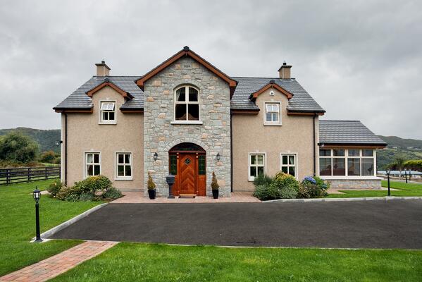 Completed photographs of completed dwelling on the Aughnamoria Road, Newry