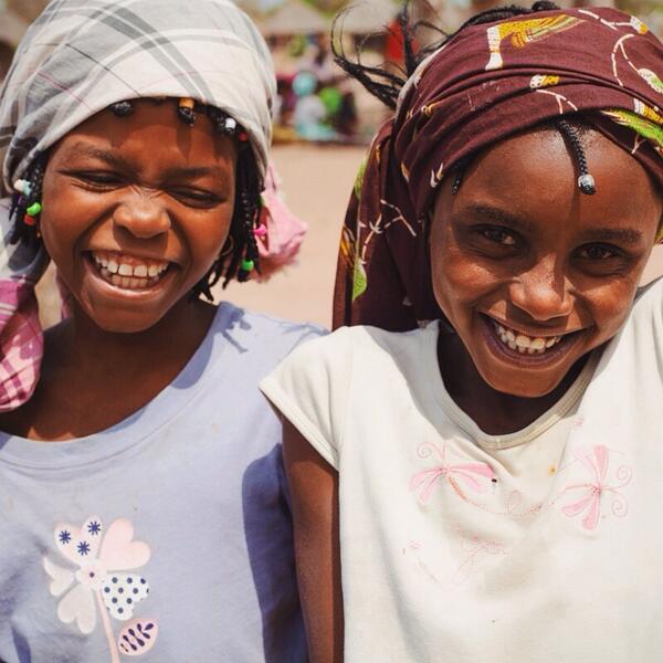 charitywater's tweet image. These girls no longer have to walk for water or worry about the crocodiles that might be in it.