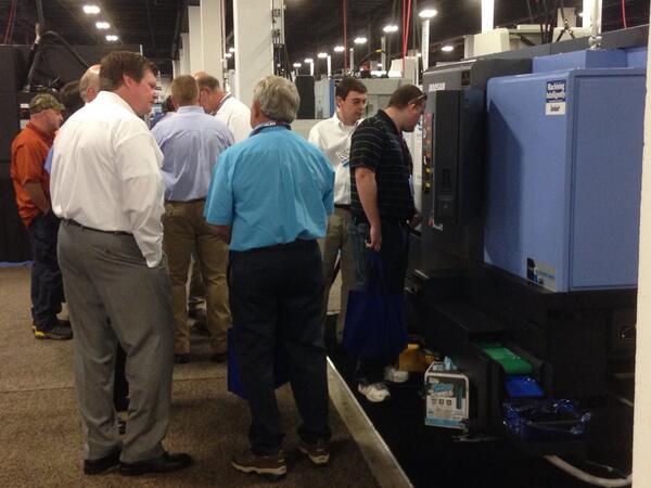 MachinerySol's tweet photo. Doosan y axis with sub demo in booth 1309. http://t.co/m80sezHv4S