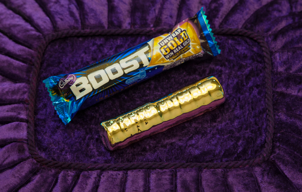 CadburyUK's tweet photo. Someone got more of a Boost than expected: A solid gold one! #UnwrapGold There's still 5 more Gold bars out there! http://t.co/s2LOEPbI5L