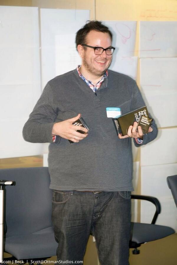 PressXToJustin's tweet photo. Super flattering photo of me and my @CAH haul from #Be_Chicago ;) http://t.co/6wVHjzv8yZ