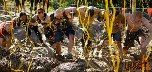 At this point: First-time #Mudders see electric wires. #RepeatMudders see FREE BEER.