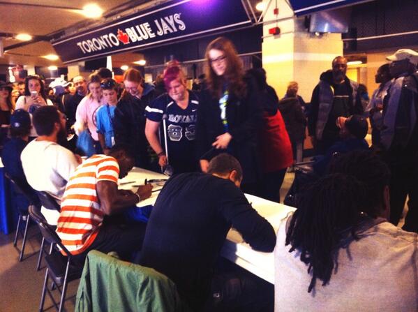 Players providing autographs post #faithnight <a href="/AIACanada/">Athletes in Action Canada</a>