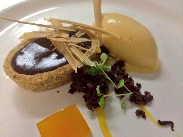 Valrhona tart w hazelnut pastry, apricot sorbet, passion fruit