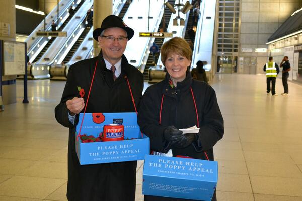Fitz_xMP's tweet photo. Sheila and I selling poppies at Canary Wharf earlier. We'll be there most days this week 7-8. Stop by and say hello! http://t.co/0HQ5a5QP4k