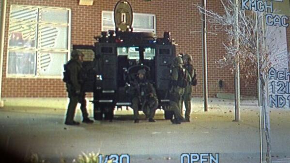 DoughertyKMGH's tweet image. From my viewfinder, @DenverPolice SWAT just left the south entrance to Noel Middle School in #Denver. #wrappingup