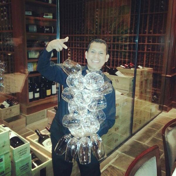 DelFriscosLV's tweet photo. How many glasses do you think Rolando is carrying? http://t.co/LslpCDMkA3