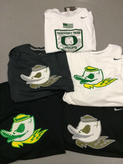 DuckSwag's tweet photo. #DuckSwag travel shirts for @OregonMBB for the Armed Forces Classic with the new #CombatDuck logos #GoDucks http://t.co/Vx9J7MBEDF