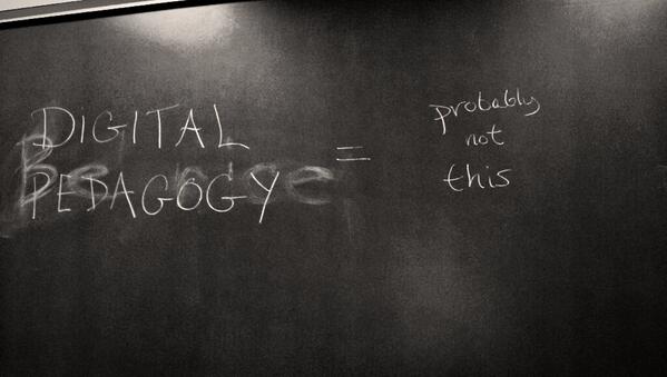 The <a href="/THATCampSTL/">THATCampSTL</a> digital pedagogy session room is of course the one with all blackboards &amp; 1 pull-down screen. Hee.