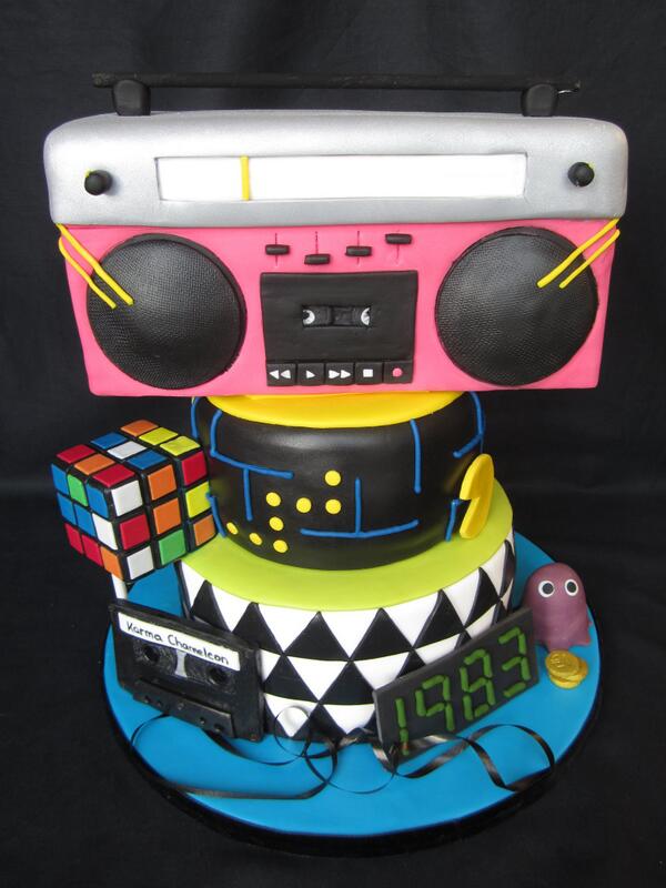 emmabscakery's tweet photo. #80s #boombox #cake 
80's cake with boombox, packman and rubix cube! http://t.co/oA78cdaM7L