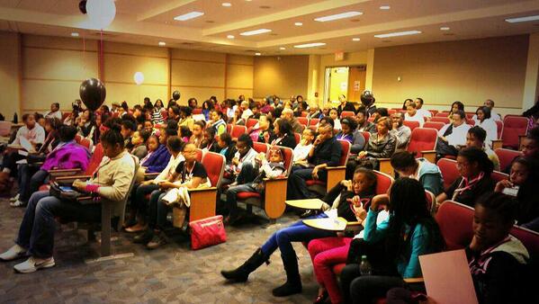 BlackGirlsCode's tweet photo. Students and parents gather in Spelman auditorium as teams pitch their mobile app ideas to the crowd #BGCSpelman http://t.co/H7rYeIrMvh