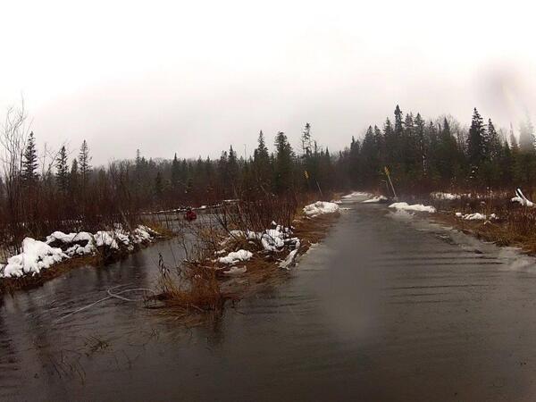 Sledtime's tweet photo. Amazing feat by Sault Club volunteer John Breckenridge in ice cold water tying steel cable onto sunken bridge http://t.co/MPMSwKppa4