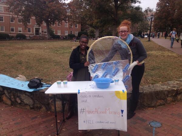 StatusQuoMobile's tweet photo. #HaveAGoodMorning in the quad! Sign the pledge to practice safe sex and get free condoms and orange juice http://t.co/6Nuwzg3PUt