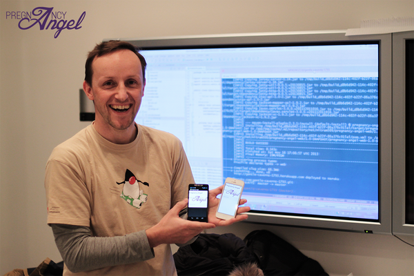 PregnancyAngel's tweet photo. @nitram509 presenting our first app prototype! ROCK ON! #swberlin http://t.co/k8d5AVHJly