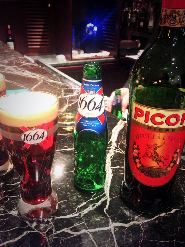 DanGutter's tweet photo. just got to Alsace. apparently amer picon and beer is a thing here. I'm embracing it. http://t.co/rNKTILrYBP