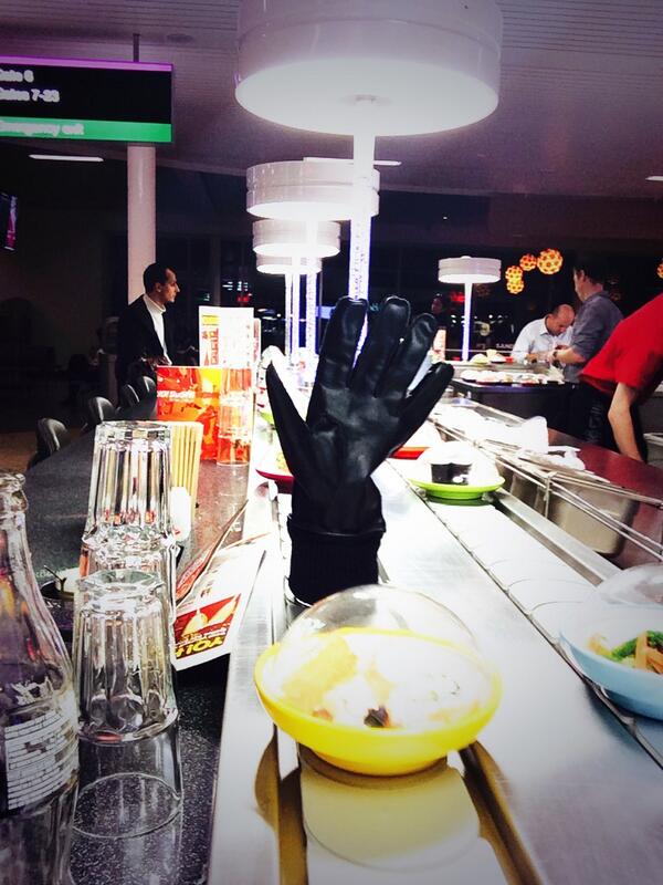 Rylan's tweet photo. Playing "what can you put on the thing and get it all the way round " at @YOSushi . I succeeded with my glove! http://t.co/6539tNan1X