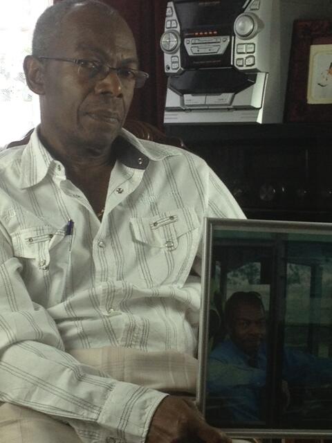 RememberSLtimes's tweet photo. Popular Slough bus driver Harold Easy discusses driving all over the country. Here he holds a photo of him at work http://t.co/plSY5IeFk5