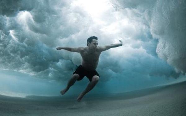 A swimmer pauses inbetween the shockwaves at Bronte beach, Sydney