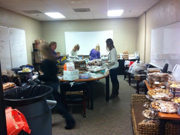 PTA volunteers hard at work tonight setting up for the Grandparent's Tea.  Thank you ladies!