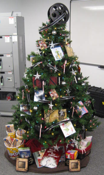crum_electric's tweet photo. Crum Electric's Movie Nostalgia Tree - to be auctioned off for the Special Olympics Festival of Trees fundraiser! http://t.co/eawUj4skn3
