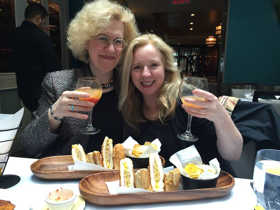 Sara Davis Buechner and <a href="/ViolinChase/">Stephanie Chase</a> take a break from rehearsal for some Cuban sandwiches.