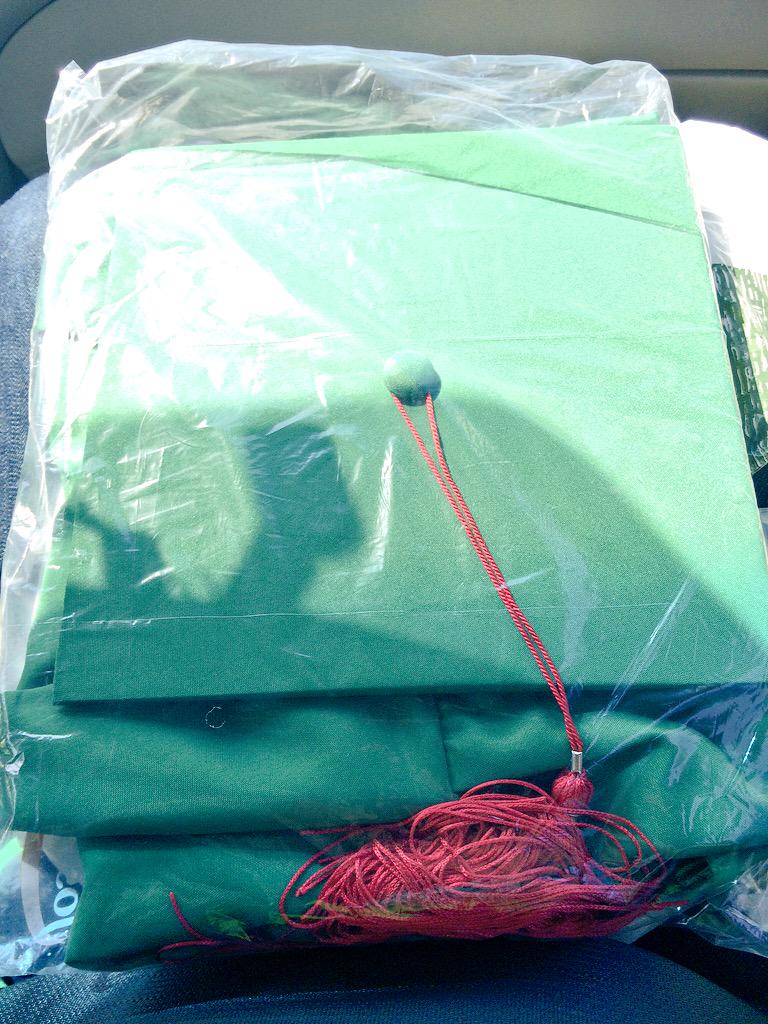 I'm going to look like a Christmas tree at graduation #greengown #redtassel #unt 😑