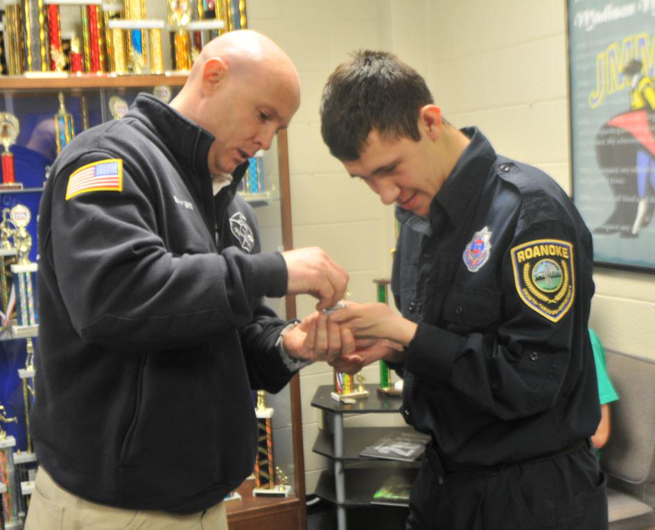GTO Cadet Josh Leonard helped w/ our <a href="/ProjectLifesavr/">Project Lifesaver International</a> today by changing a battery.  #Rke #RPDcommunity