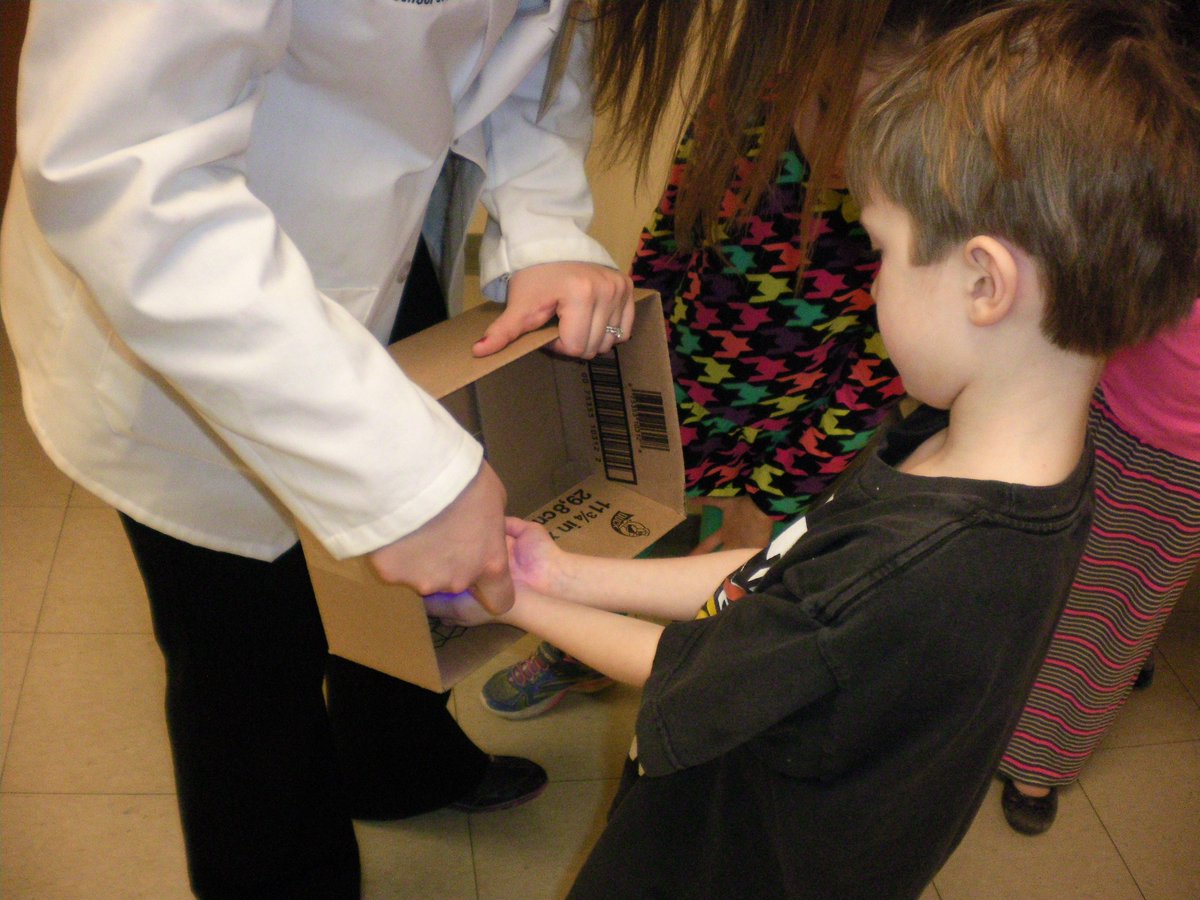 SIUE School of Pharmacy gives presentations on germs.