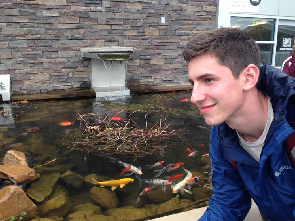 BUASB_Roanoke's tweet photo. Josh being zen with his koi fishezzz #BUasb #koi http://t.co/mipkjnmVU4