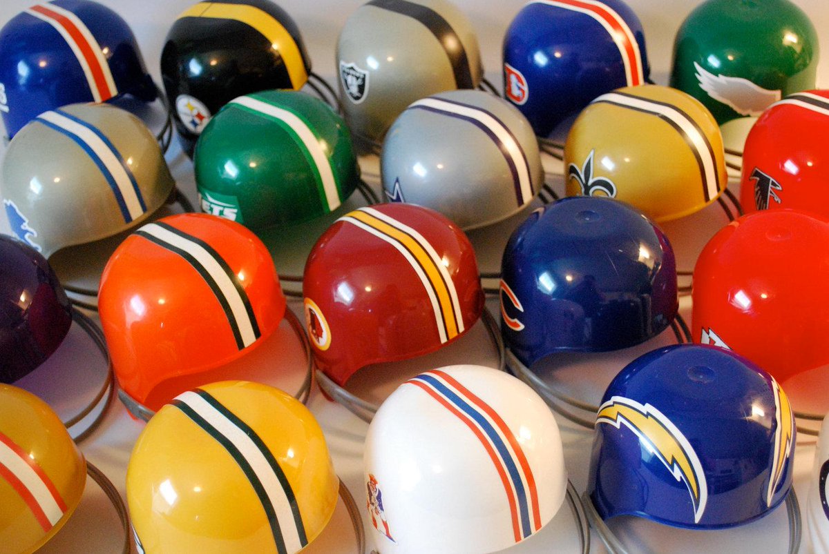 Vintage 1970s Dairy Queen ice cream sundae football helmets. I'm  experiencing a loss of oxygen to my brain now.