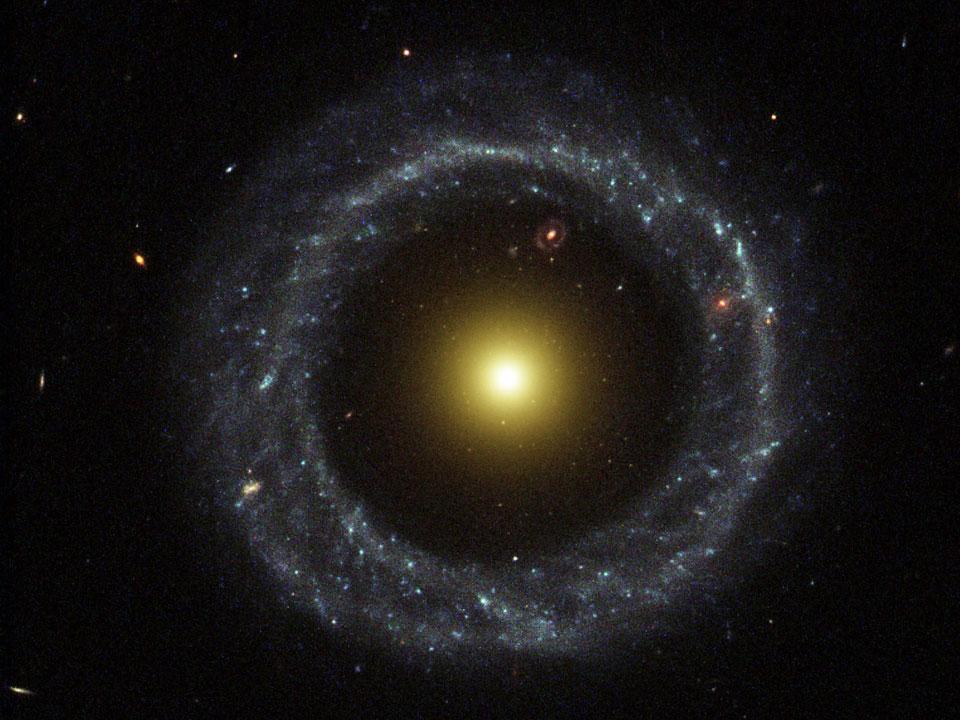GalaxyNumbers's tweet photo. Hoag's Ring Galaxy. Amazingly, far in the distance is another of these fairly rare ring galaxies. http://t.co/cBVlzDLcjX