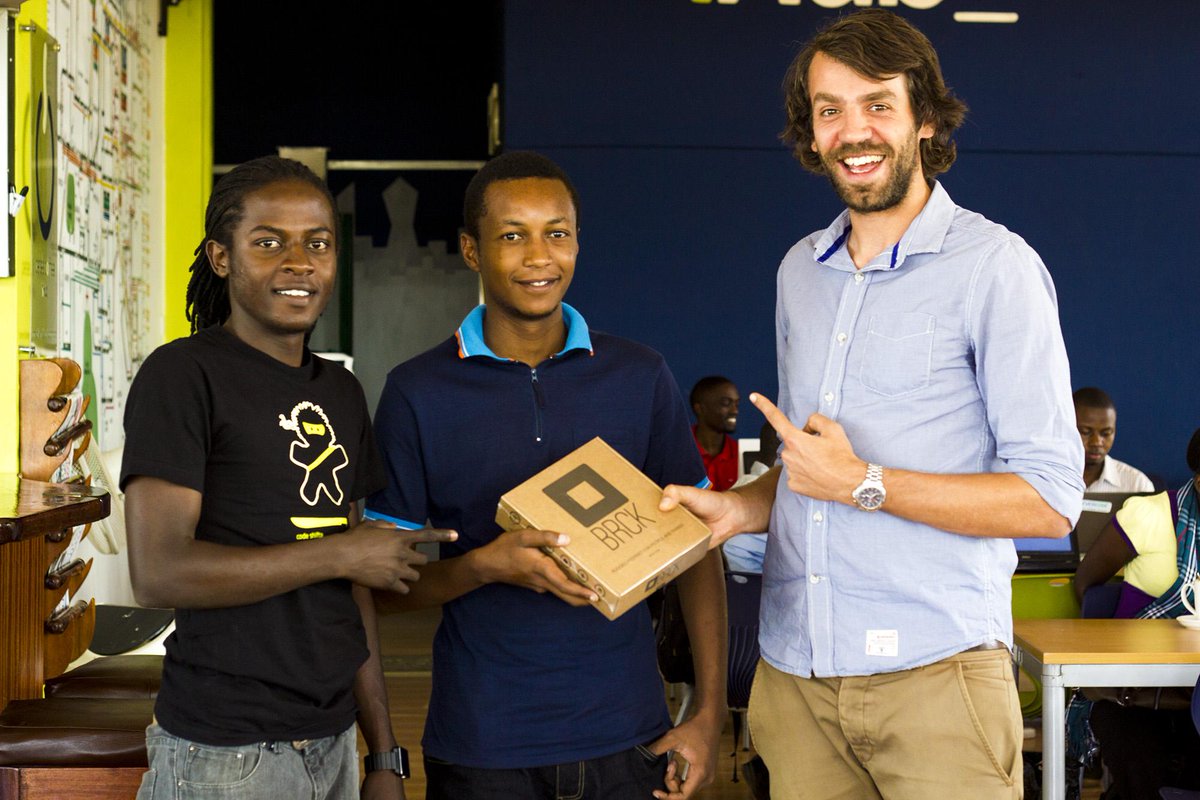 FrontlineSMS's tweet photo. Our CTO @pitkin giving a @brcknet to winner Dennis for our #5YrTechBash SMS #QUIZ @iHub @Africastalking http://t.co/e0rWMEbphd