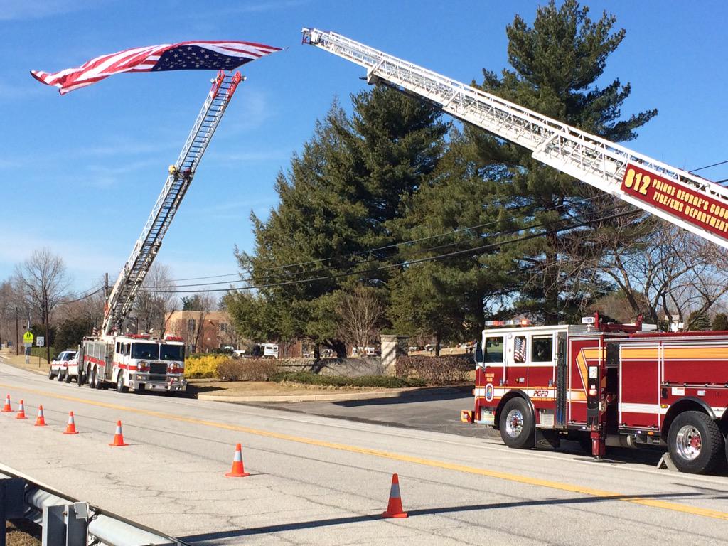 Pgfd Ladder Trucks Form Crossed Arches Flag Lakemont Memorial