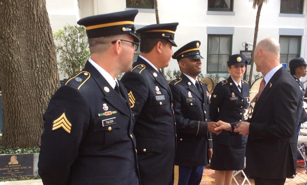 13thArmyBand's tweet image. SGT Jones, @FLGuard , receives a Governor's coin from @FLGovScott during #militaryappreciation day, #guardexperience