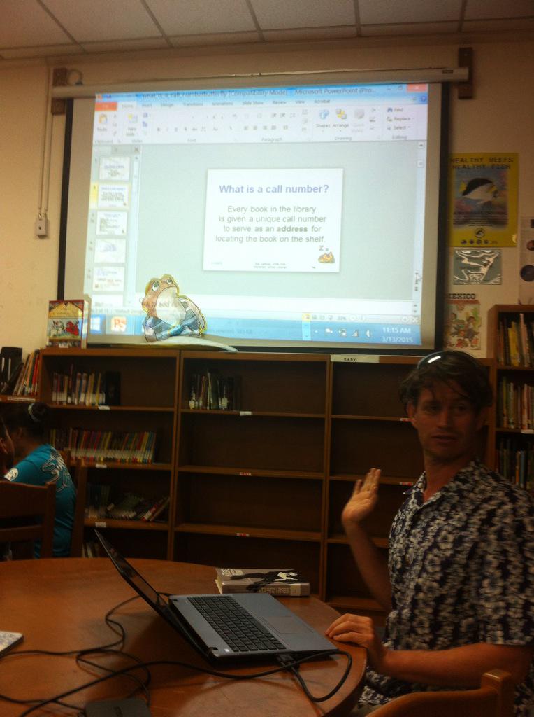 WinniPC's tweet photo. Mr. Sondheim using PPT to teach students how to locate books in Library #PSStech #DLDay #WSRES http://t.co/gDPAwvt2DM