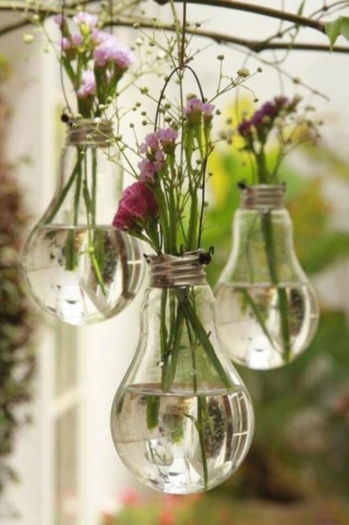 There are so many amazing uses for old lightbulbs, we love these recycled lightbulb vases 🌸 #recycle #lightbulb #diy
