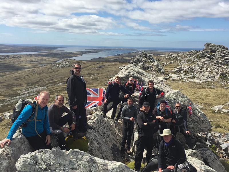 FalksYomp2015's tweet image. Andy Pap (stood) of Dunblane, Scotland carried the Union Flag all the way across the #falklands #britishfalklands