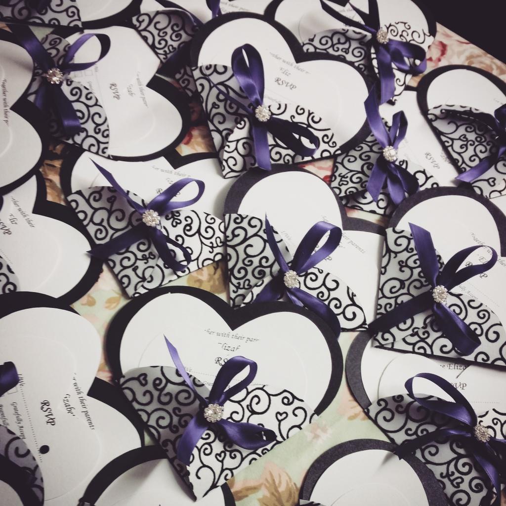 PaperRoseLou's tweet photo. bespoke heart pocket wallets, available in any colour #quirky #weddings #handmade #weddinginvitations #heart http://t.co/Ntpgm4U5Ni