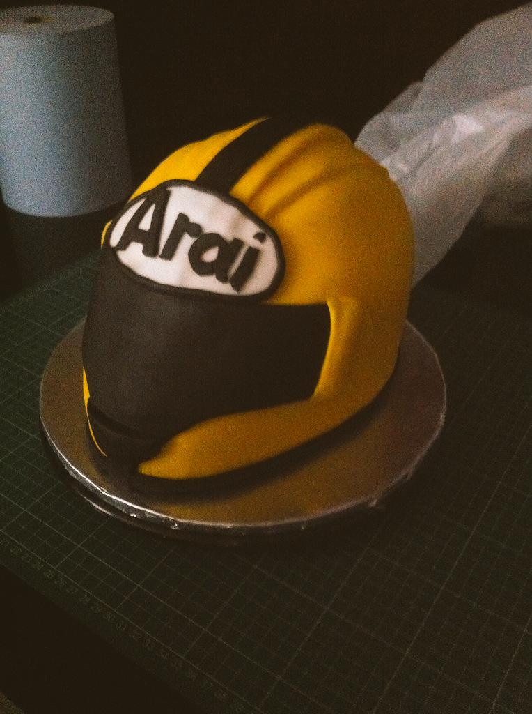 45bakerst's tweet photo. Two new cakes this week, Joey Dunlop yellow helmet for biker. Buzz light year for mason who was two on saturday. http://t.co/j67doKrQFG